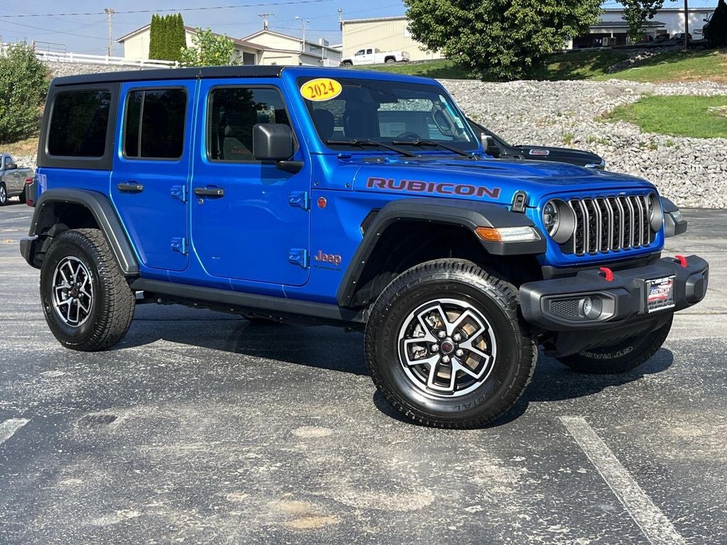 2024 Jeep Wrangler Rubicon in Blue Pearl — front three-quarter view