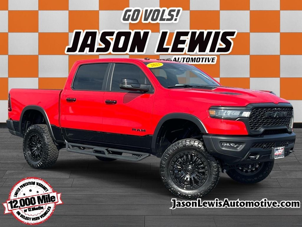 2025 RAM 1500 Rebel in Flame Red Clearcoat — front three-quarter view