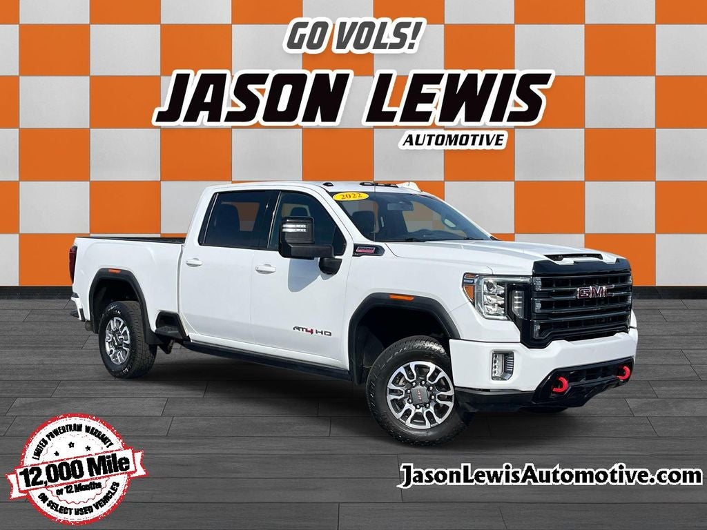 2022 GMC Sierra 2500HD AT4 in Summit White — front three-quarter view