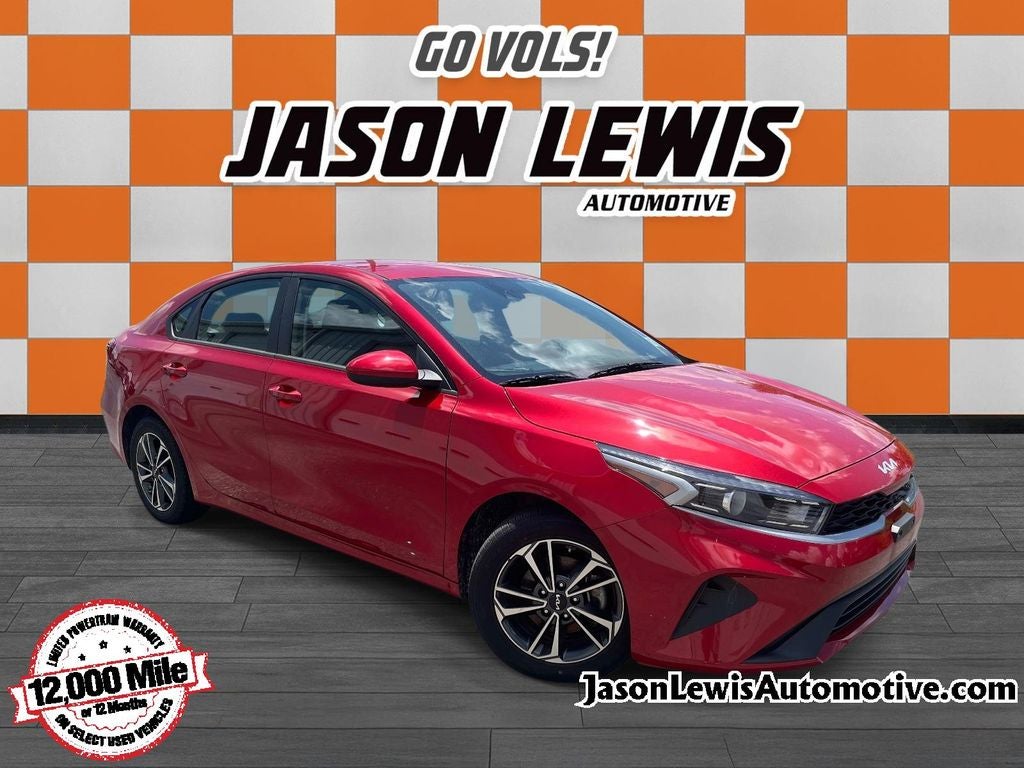 2024 Kia Forte LXS in Currant Red — front three-quarter view